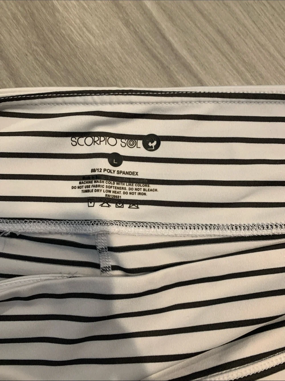 Scorpio Sol White Leggings with Black Stripes